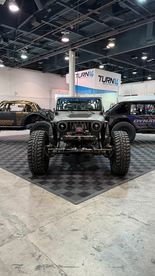 Instagram post by @recoil_tj for Motobilt. Caption reads: SEMA show is a hell of an experience! This massive....