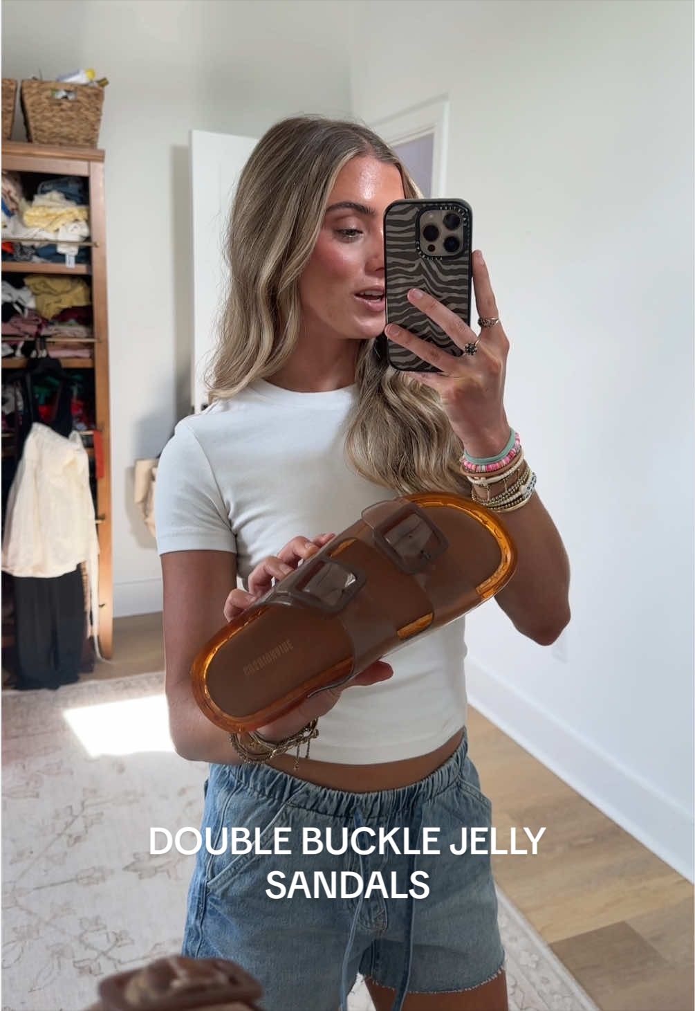 TikTok post by @sloanevosen for Cushionaire. Caption reads: [...] #jellysandals #dealsforyoudays @Cushionaire.
