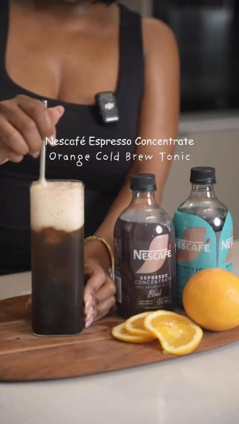 Instagram post by @missshozi for NESCAFÉ. Caption reads: [...] this Orange Cold Brew Tonic made with....