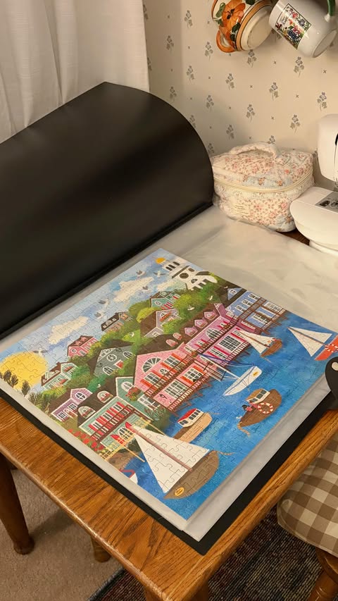 Instagram post by @intothecozycorner for All4JIG. Caption reads: A fun storage solution for your puzzles!🧩💓

The....