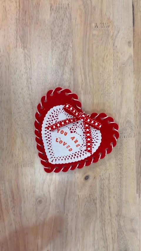 Instagram post by @julieswreathboutique for Hobby Lobby. Caption reads: [...] Valentine section and party decor at Hobby....