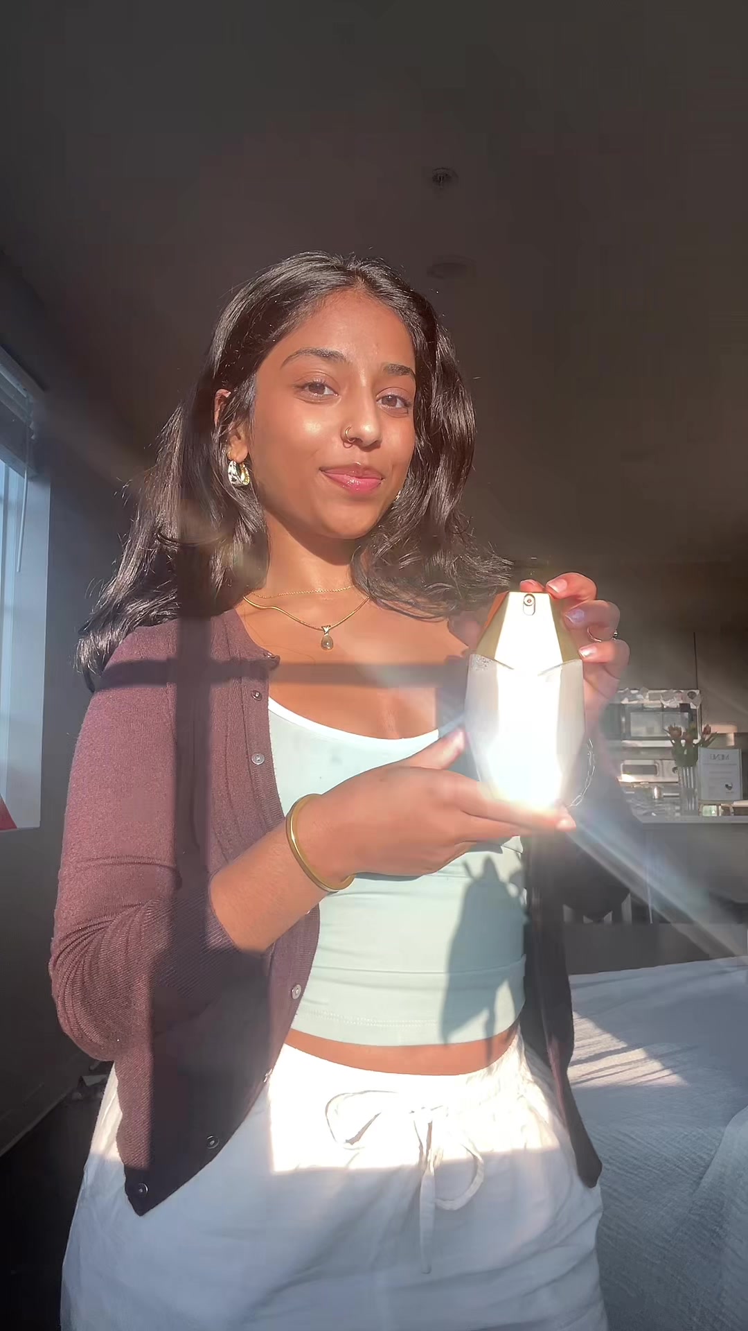 TikTok post by @shivanii_123 for Orebella. Caption reads: new perfume for spring 🩵 | gifted by Orebella....