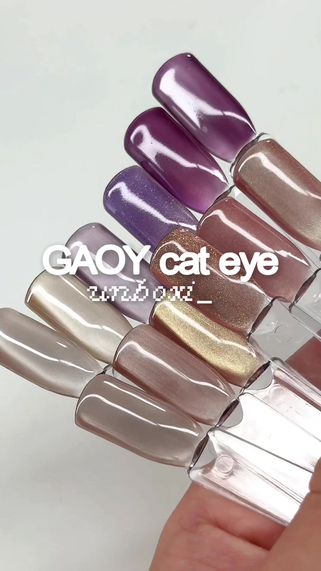TikTok post by @nailedby.alexia for GAOY. Caption reads: [...] & swatch some new cat eye gels from....
