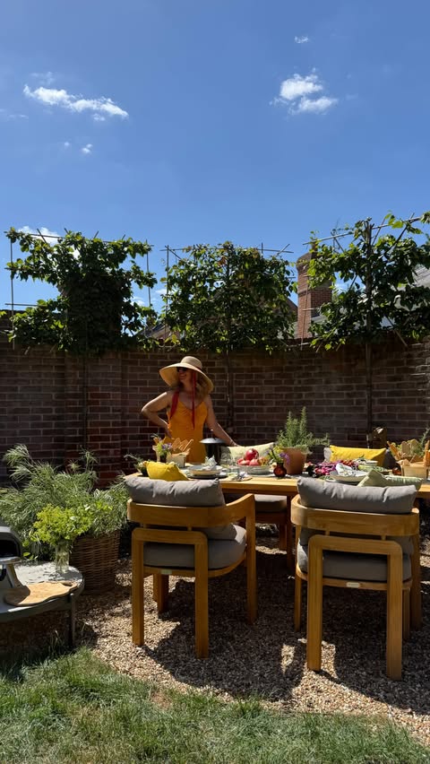 Instagram post by @erica_davies for John Lewis & Partners. Caption reads: [AD] There’s something about eating outside that....