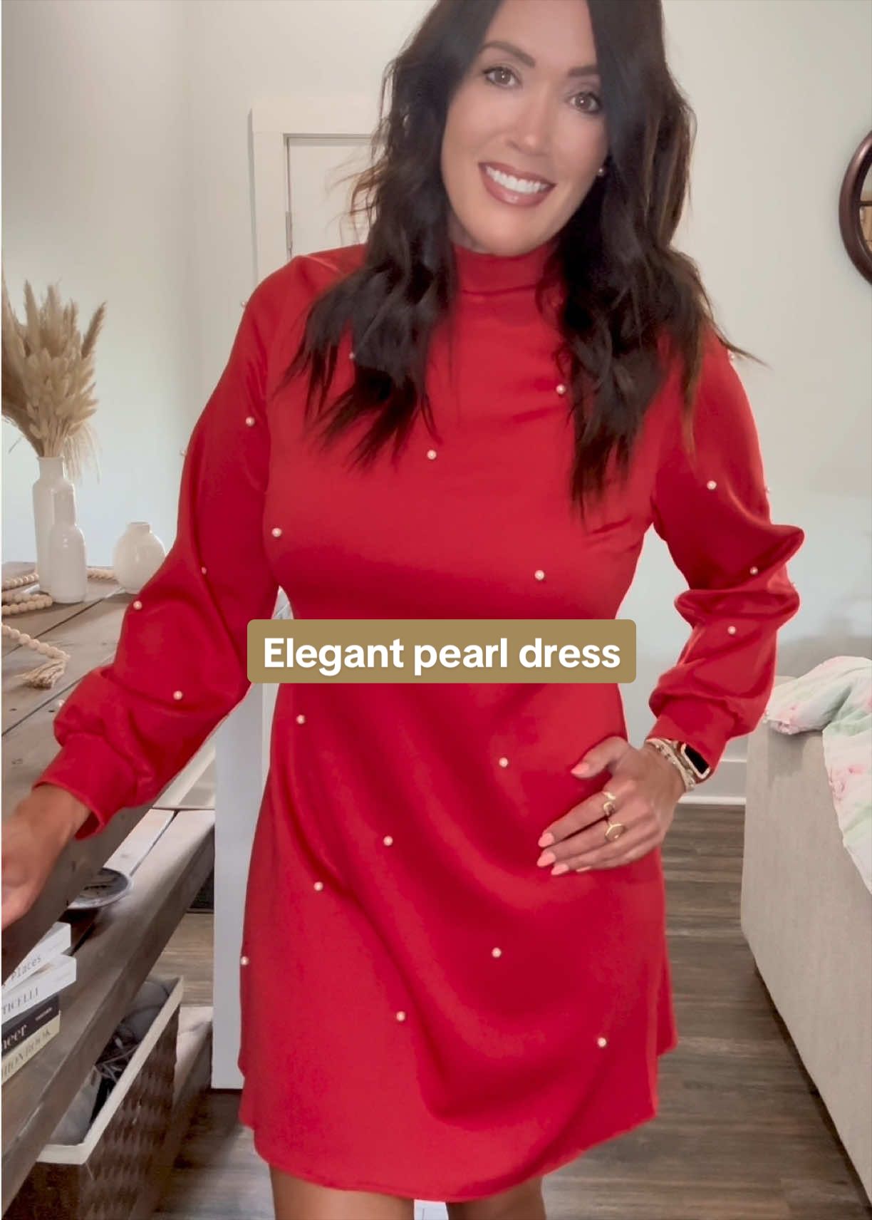 TikTok post by @katabild for Hyz. Caption reads: This beautiful pearl, puff sleeve dress would be....