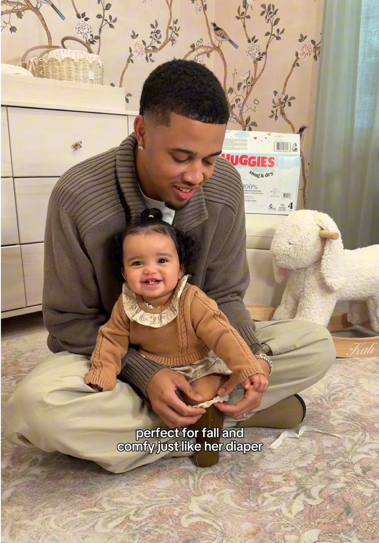 TikTok post by @kburton_25 for Huggies. Caption reads: #Ad Daddy-daughter fit check time! Every outfit....