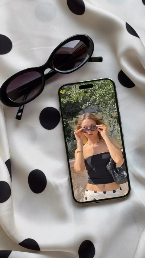 Instagram post by @elena_secchi for Hawkers. Caption reads: [...] outfit follows the sunglasses 🕶️🫰🏼✨....