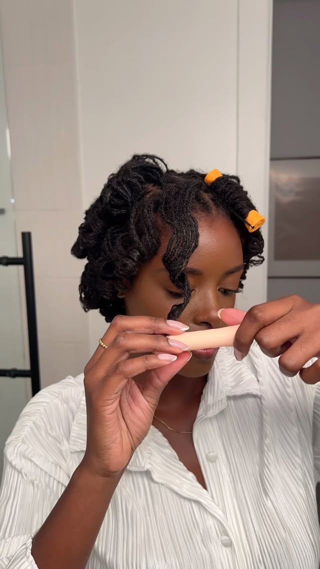Instagram post by @byfarahjean for Design Essentials. Caption reads: [...] and curlsssss • product used:....