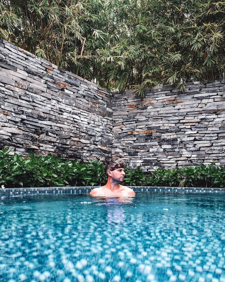 Instagram post by @explorewithlee for Passion Passport. Caption reads: It may look like I'm all alone enjoying this....