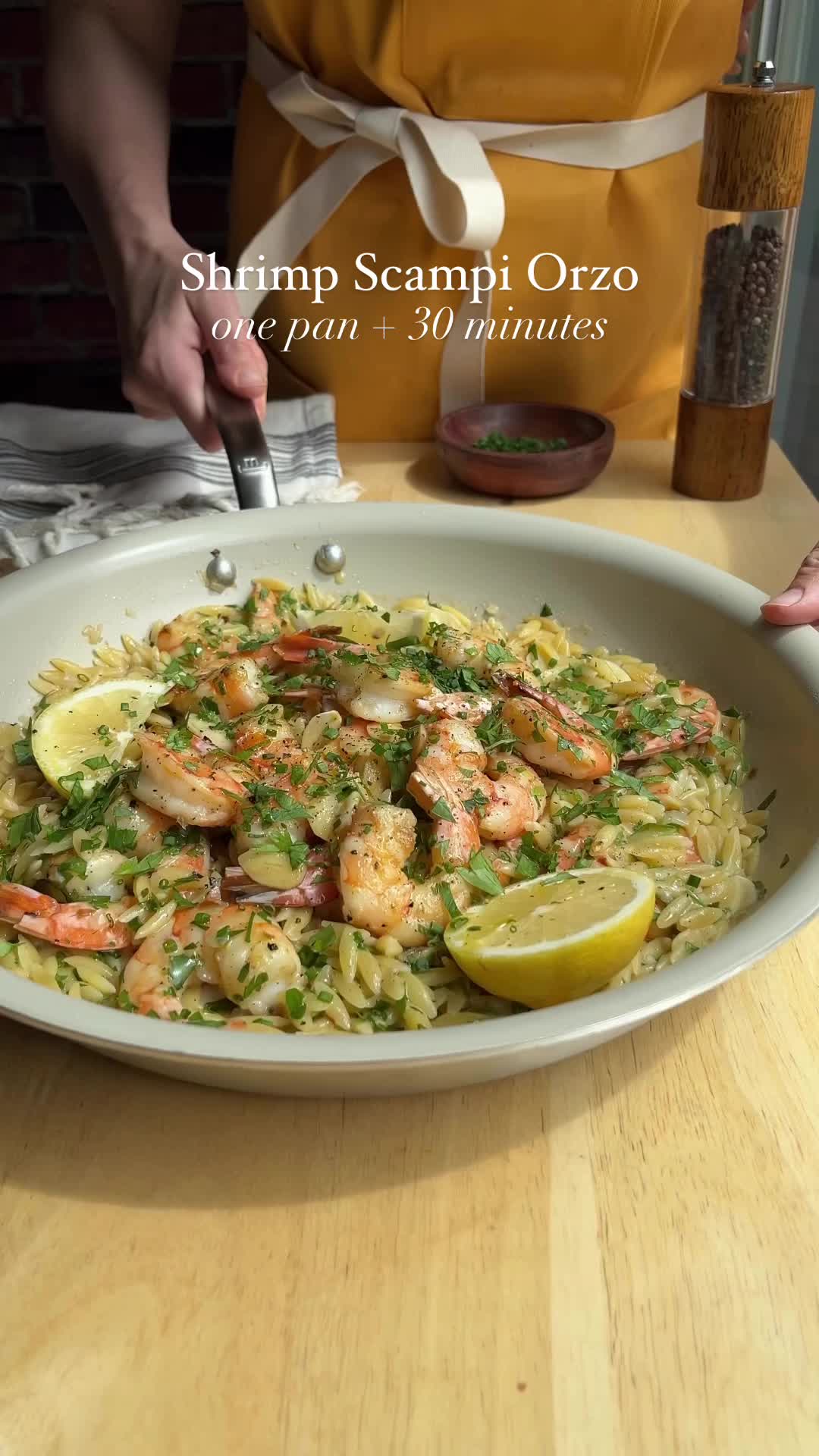 TikTok post by @dishingouthealth for Made In Cookware. Caption reads: Shrimp Scampi Orzo is the ultimate 30 minute, one....