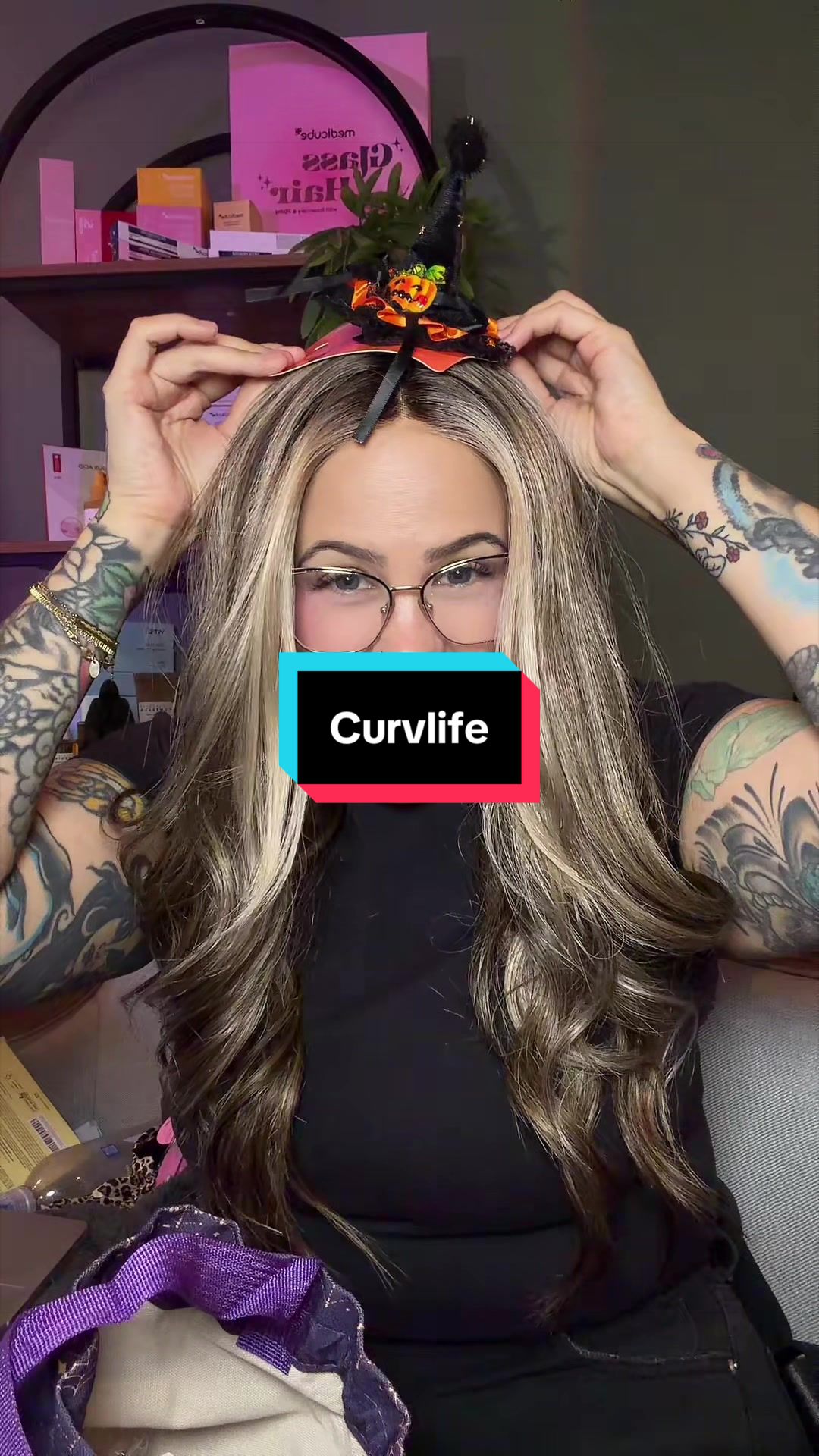 TikTok post by @carnival_lights for CurvLife_official. Caption reads: @Curvlife #halloween #curvlife #pressonnails....