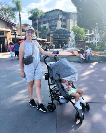 Instagram post by @nataliahollup for Delta Children. Caption reads: The stroller we chose for our Disney trip was the....