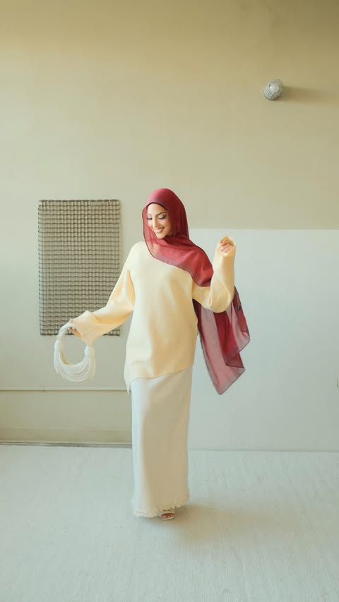 Instagram post by @luckyzaina for Veiled. Caption reads: Styling these pieces from @veiledcollection....