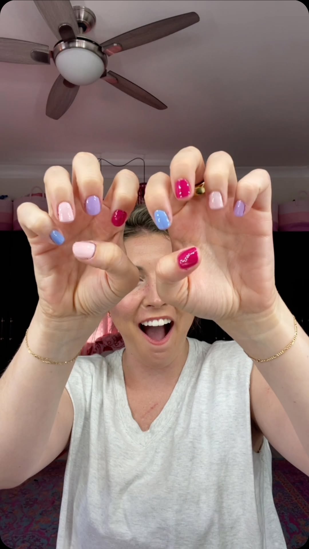 Instagram post by @reagan.baylee for Le Mini Macaron. Caption reads: GEL NAILS AT HOME 👀🩷 #LeMiniMacaronPartner I am....