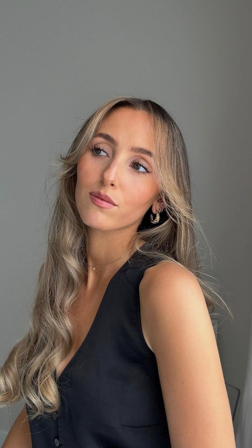Instagram post by an influencer for Marks & Spencer. Caption reads: Glowy summer makeup using my favourite products....