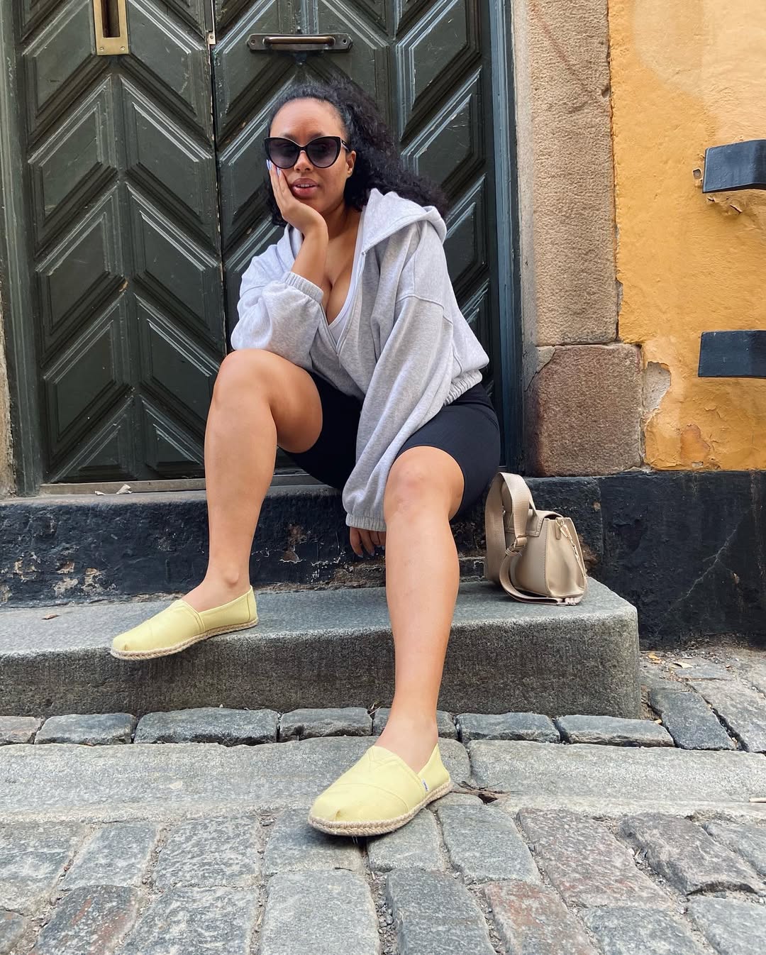 Instagram post by @nikitauggla for Toms. Caption reads: ♥️TOMS is a B Corp Certified footwear and....