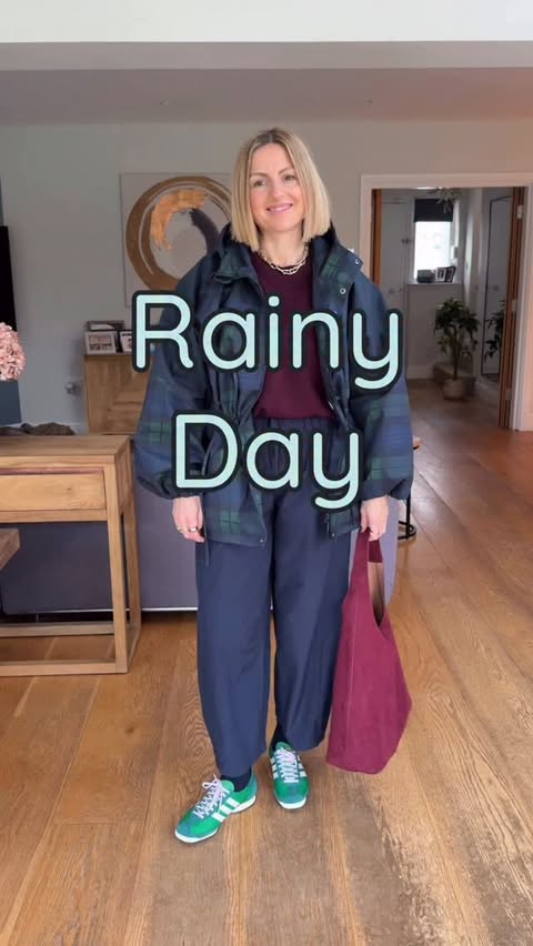 Instagram post by @lisamichellestyle for LOVALL. Caption reads: I find rainy days the hardest weather to dress for....