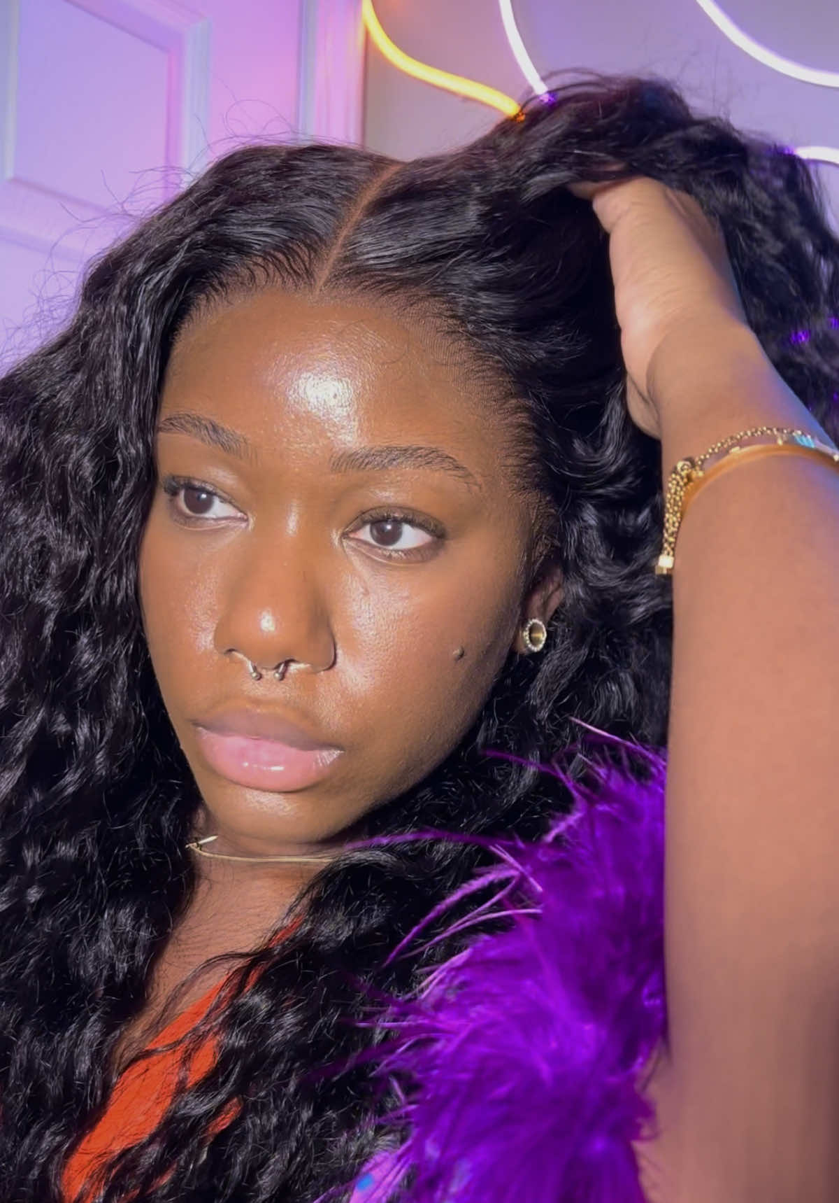 TikTok post by @zhanealiya for Wavymy Hair. Caption reads: This is my second wand curl wig but my first time....