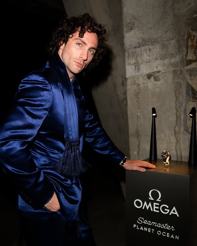 Instagram post by @aarontaylorjohnson for OMEGA. Caption reads: [...] to the bold spirit of Planet Ocean. #OMEGA....