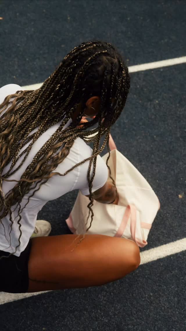 Instagram post by @jo_rawb for MONDAY Haircare. Caption reads: My track bag isn’t complete without....