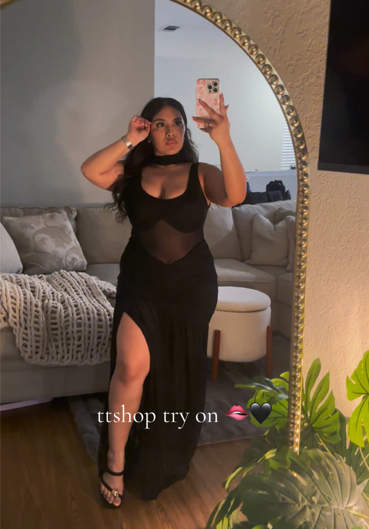 TikTok post by an influencer for HYZ. Caption reads: TTSHOP never disappoints me 🫦🖤✨ #fypシ #dress....