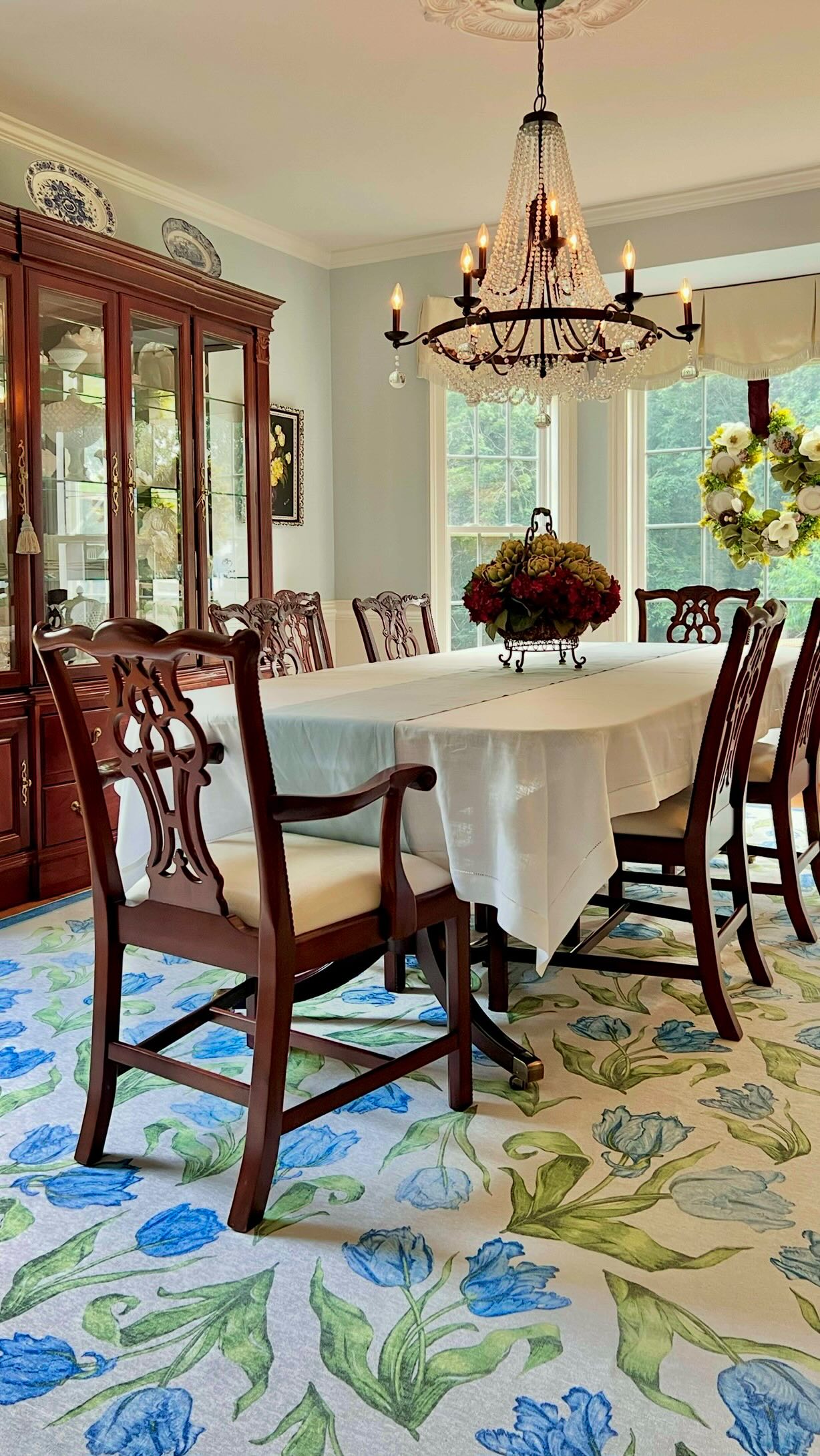 Instagram post by @justinamariehome for Ruggable. Caption reads: [...] blue and white tulip rug is from @ruggable’s....