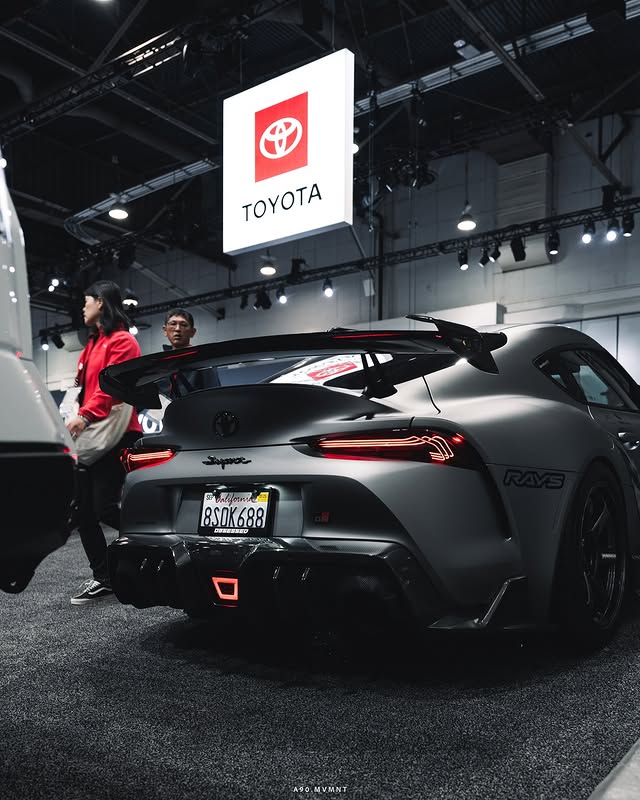 Instagram post by @a90.mvmnt for Adro. Caption reads: [...] in SEMA, @mackin_ind @rayswheelsusa &....