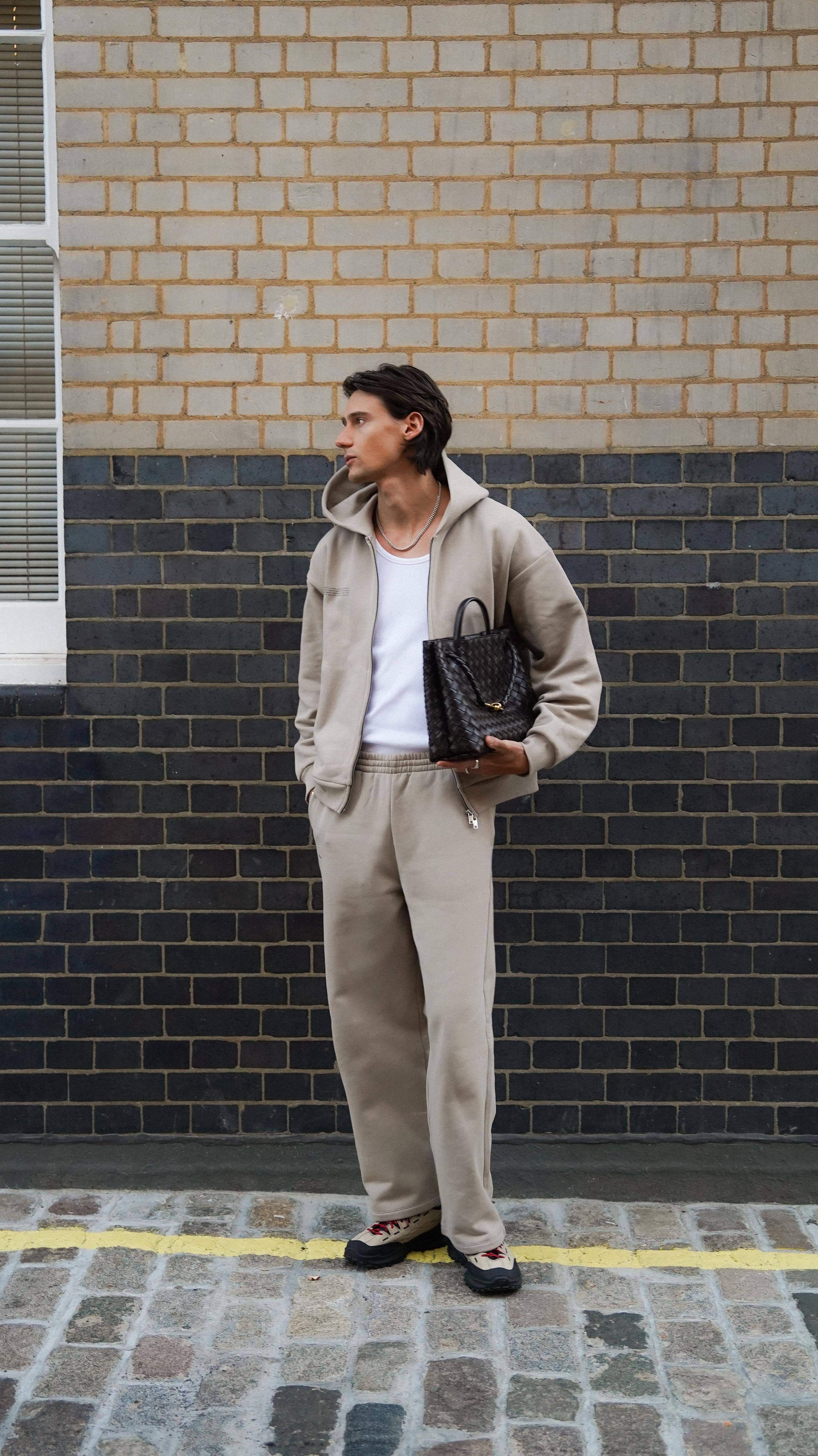 Instagram post by @isaachudson for PANGAIA. Caption reads: Your New Favourite Tracksuit 🌍 @pangaia 

Elevate....