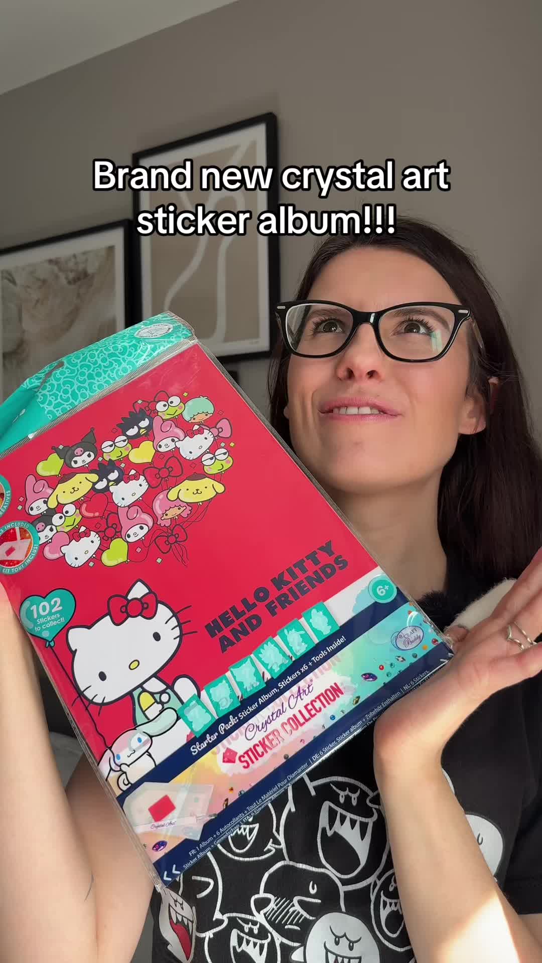 TikTok post by @violet.hollow for Craft Buddy. Caption reads: [...] Art Sticker Album for Hello Kitty 🐾 @Craft....