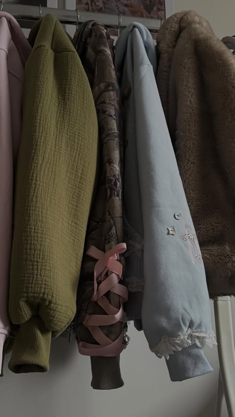 Instagram post by @leahalicehill for Dossier. Caption reads: an essential to my ootd ♥️ @dossierperfumes ambery....