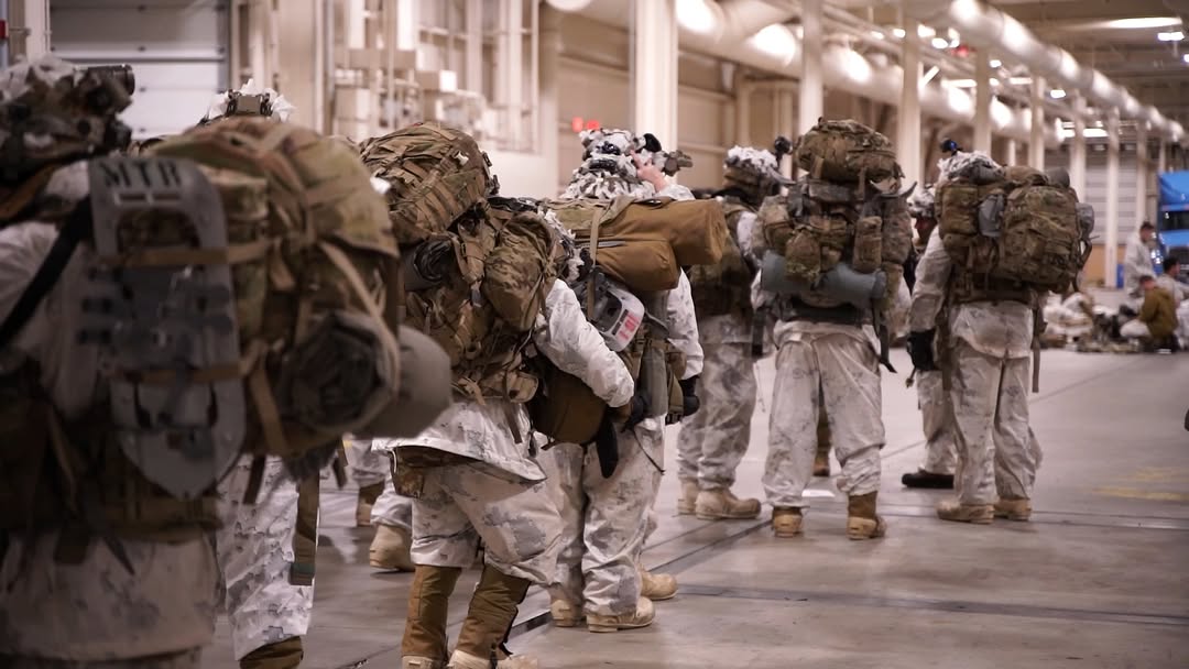 Instagram post by @11thabnangels for GoArmy. Caption reads: In the frigid cold, soldiers from 1-24 and 1-5 IN....