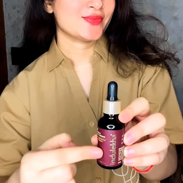Instagram post by @dranjanatyagi for Indulekha. Caption reads: Hair fall doesn’t start at the ends – it starts at....
