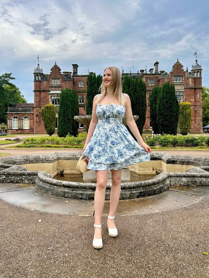 Instagram post by @lorettalotus for Scarlet Darkness. Caption reads: [...] Happy July everyone! 💕

Dress by....