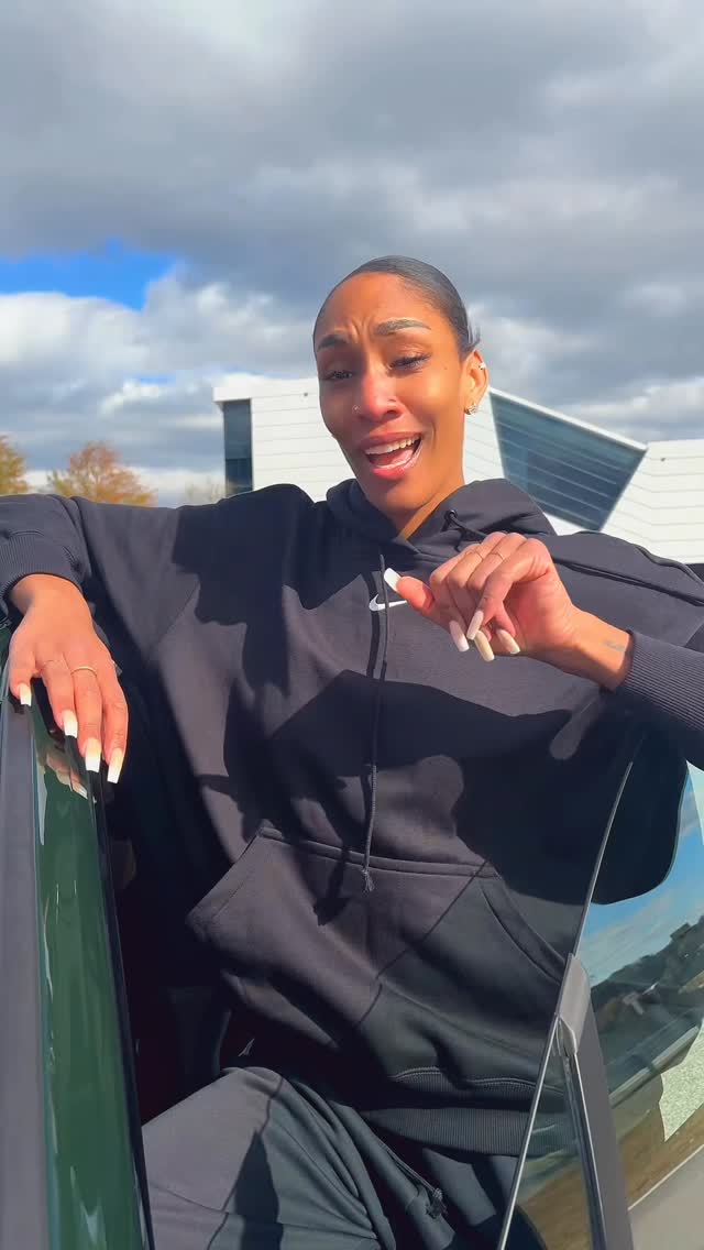 Instagram post by @aja22wilson for Porsche USA. Caption reads: I had to 🤭😂.