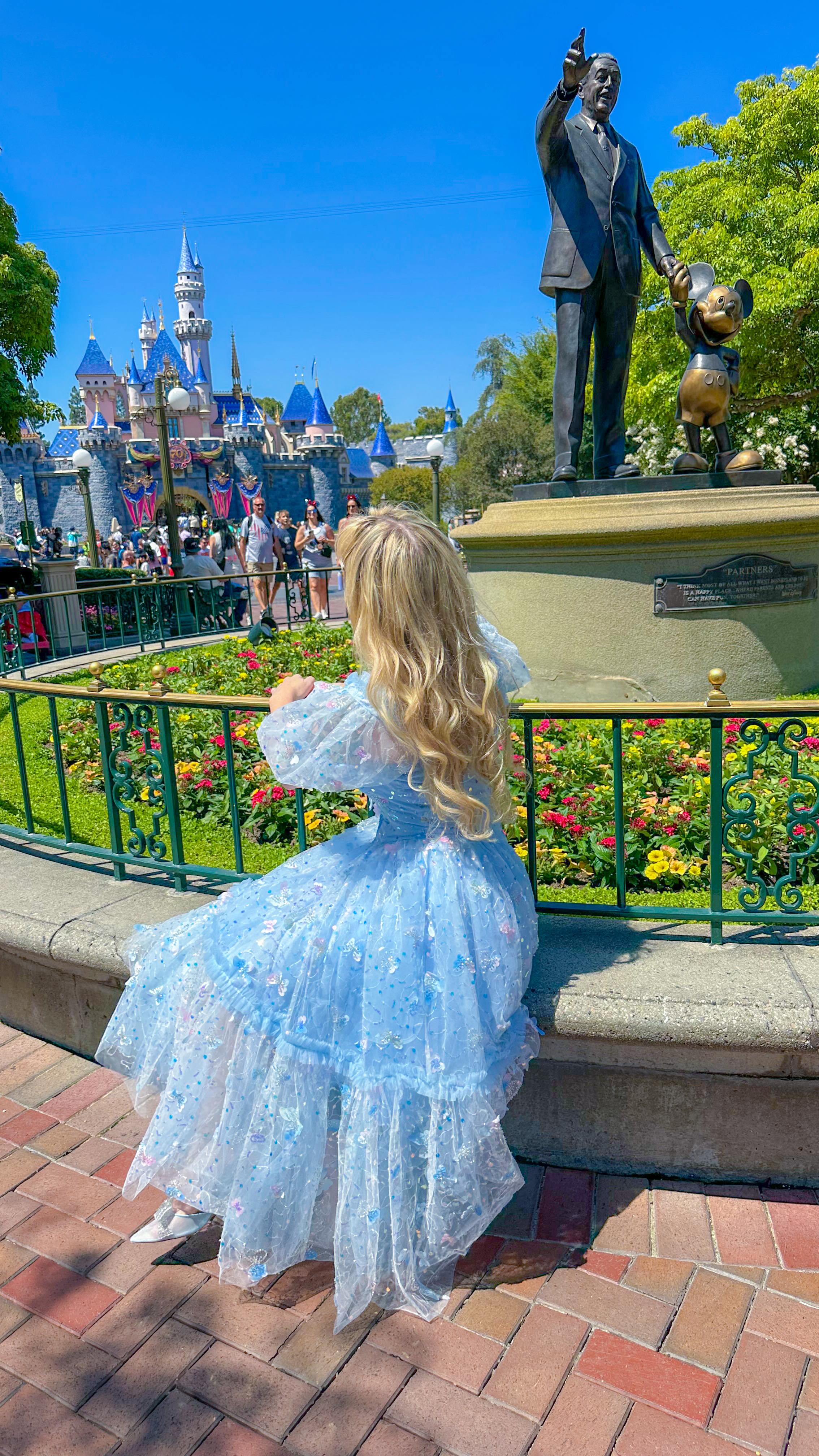 Instagram post by @travelmomoirs for Crocs. Caption reads: A REAL fairy princess dress! 😭👑✨ (gifted)

🦋 ....