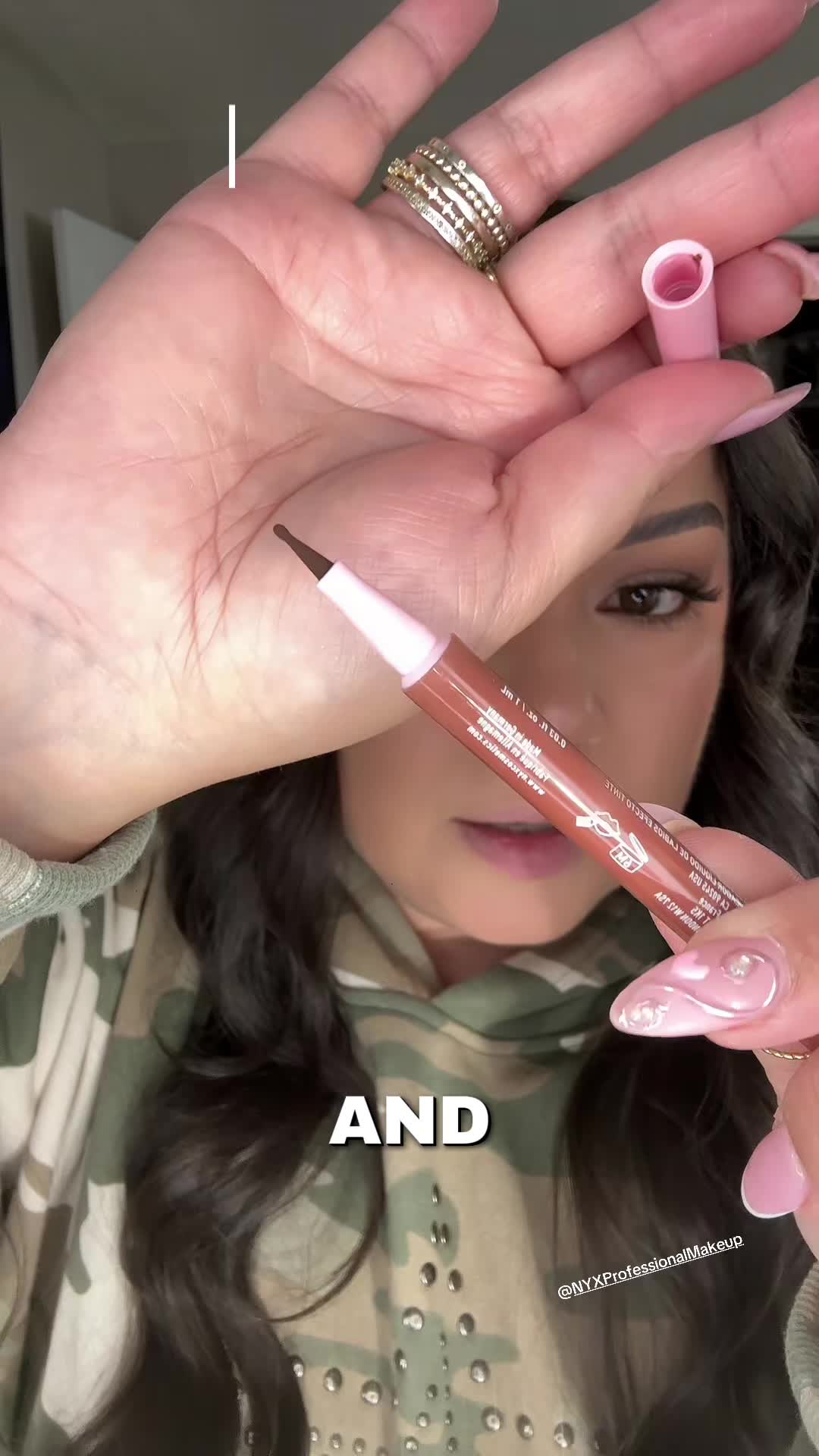 TikTok post by @lifewithmimi for NYX Professional Makeup HR. Caption reads: My new favorite lip stain!! 😍💋 #lipstainviral....