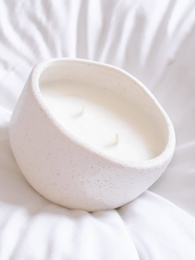 Instagram post by @tyannabrooke_ for Adairs. Caption reads: ☁️🤍🦢🎀

#adairs #homelifestyle #candle #ourhome....