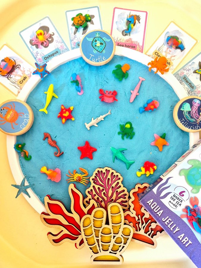 Instagram post by @perryswoodcraft for Rainbow Eco Play. Caption reads: Ad|Gifted • 🐙 Aqua Jelly Art 🐙 As soon as....