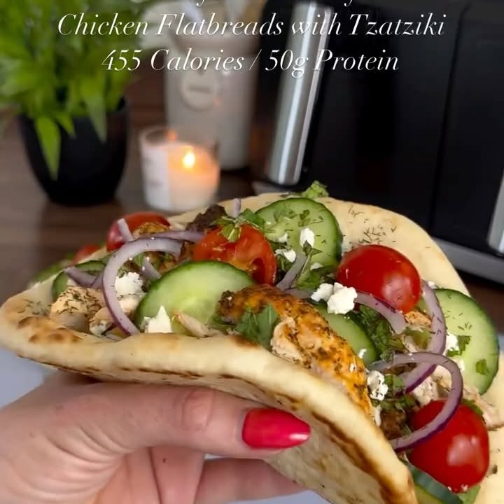 Instagram post by @slimming.gym.and.gin for The Skinny Food Co. Caption reads: Recipe below ⬇️ Air Fryer Greek-Style Chicken....