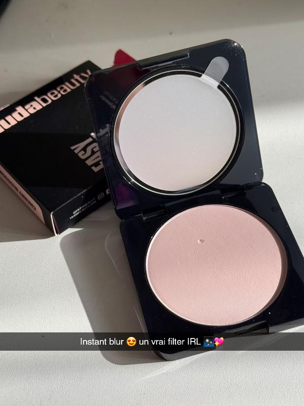 TikTok post by @didjabeauty for Huda Beauty. Caption reads: [...] powder or loose powder? #hudabeauty....