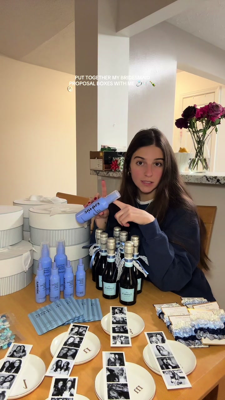 TikTok post by @emmaskylar6 for Eva NYC. Caption reads: [...] bridesmaid proposal boxes!! Thank you @Eva....