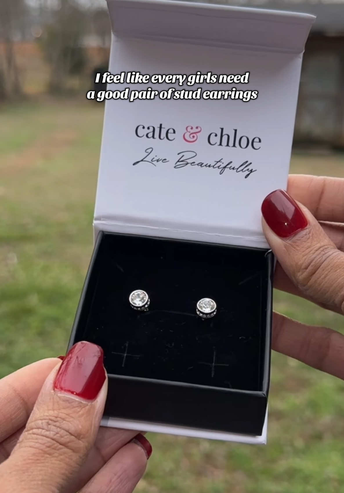 TikTok post by @kitcatt13 for Cate & Chloe. Caption reads: [...] one good pair of stud earrings! @Cate &....