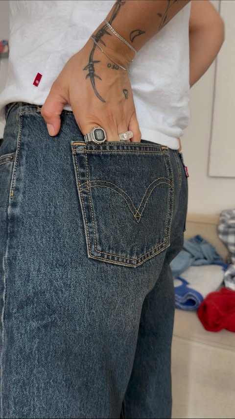 Instagram post by @helloimmaike for Levi's. Caption reads: [...] Which one would you have picked? @levis....