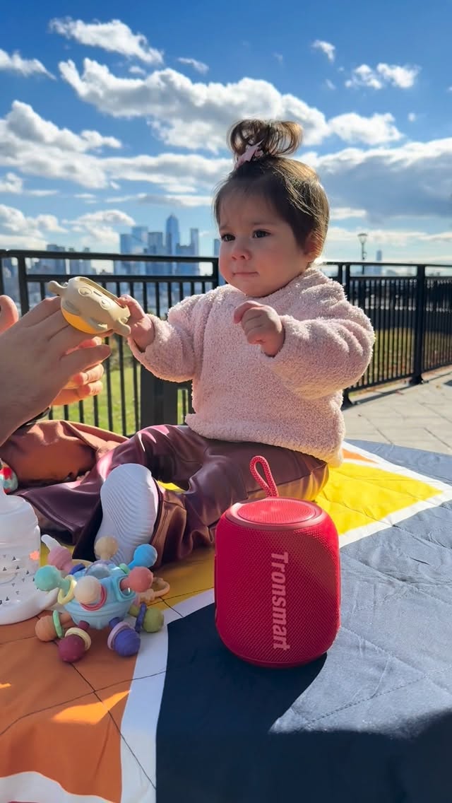 Instagram post by @guhersmomlife for Tronsmart. Caption reads: Big sound in a mini size! 🔊 The Tronsmart T8 Mini....