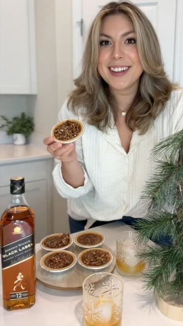 Instagram post by @foodie.girly for Johnnie Walker US. Caption reads: #AD Holiday Season is here! 🥃🥧✨ I’m celebrating....