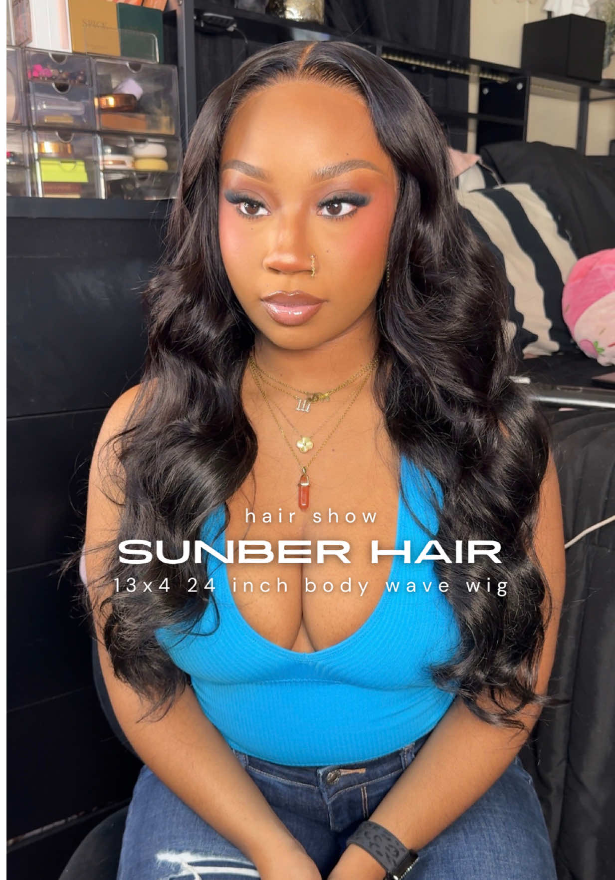 TikTok post by @thaarealbabyd for Sunber Hair. Caption reads: A wig that holds curls all day?! 🦋 @Sunber Hair....