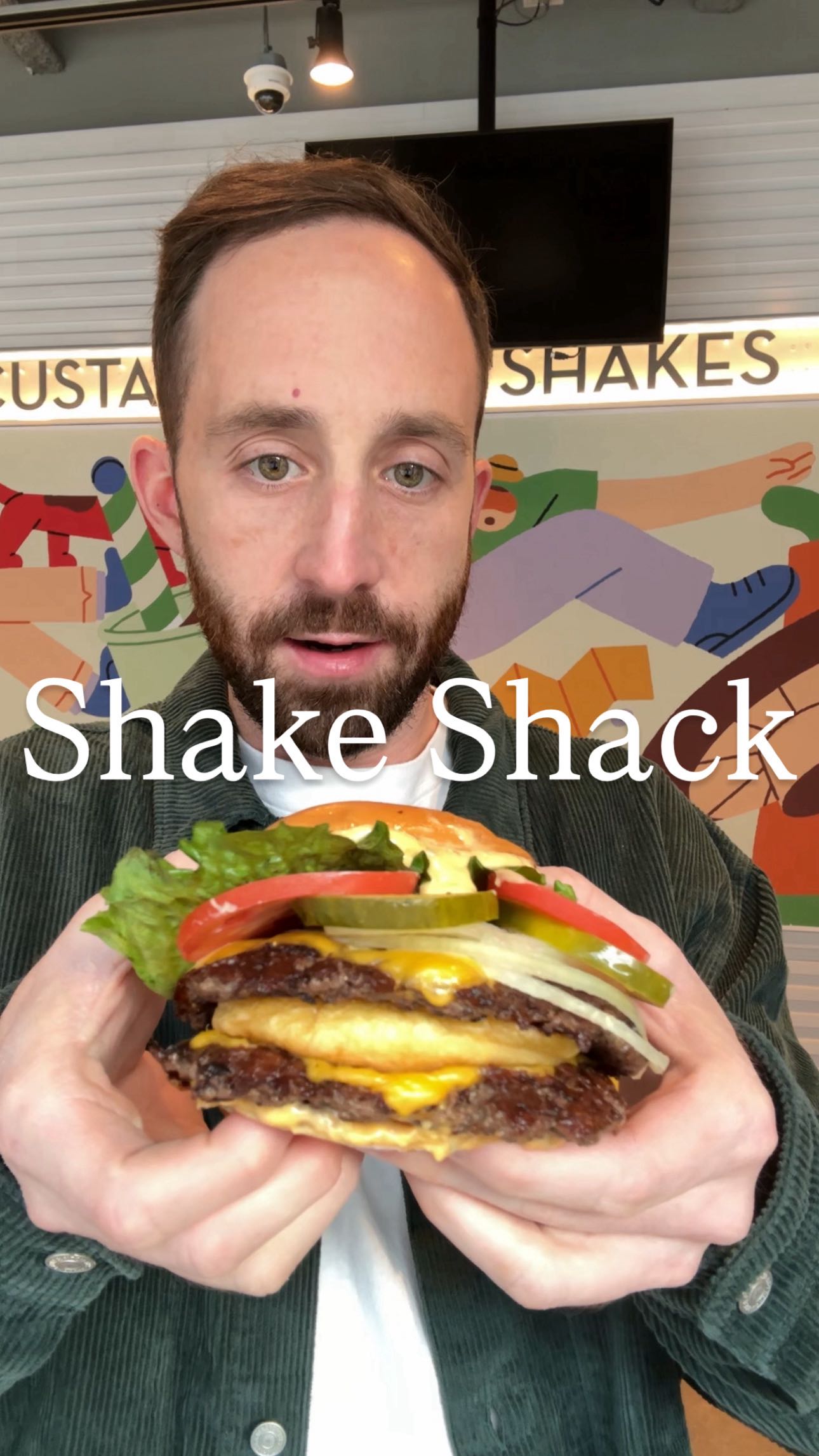 Instagram post by @theerichammer for Shake Shack. Caption reads: Another bullseye. The Big Shack, now available....