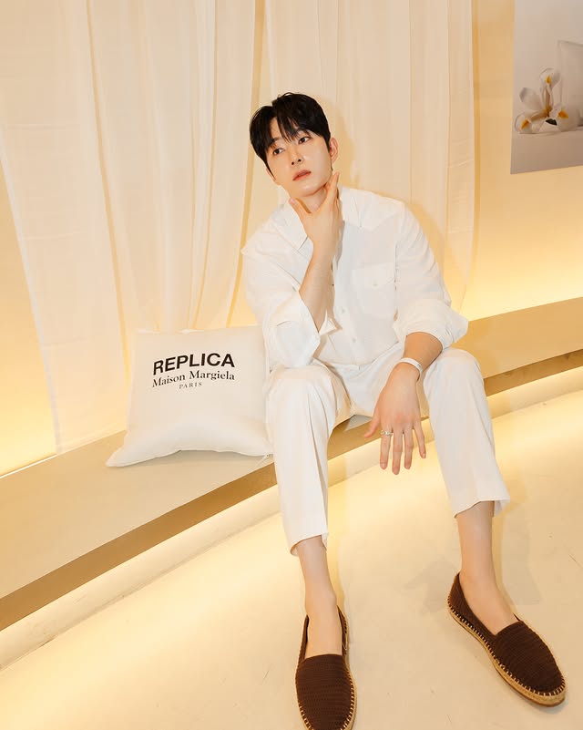 Instagram post by @donghokook for Maison Margiela Fragrances. Caption reads: [...] on warm skin envelopes the new....
