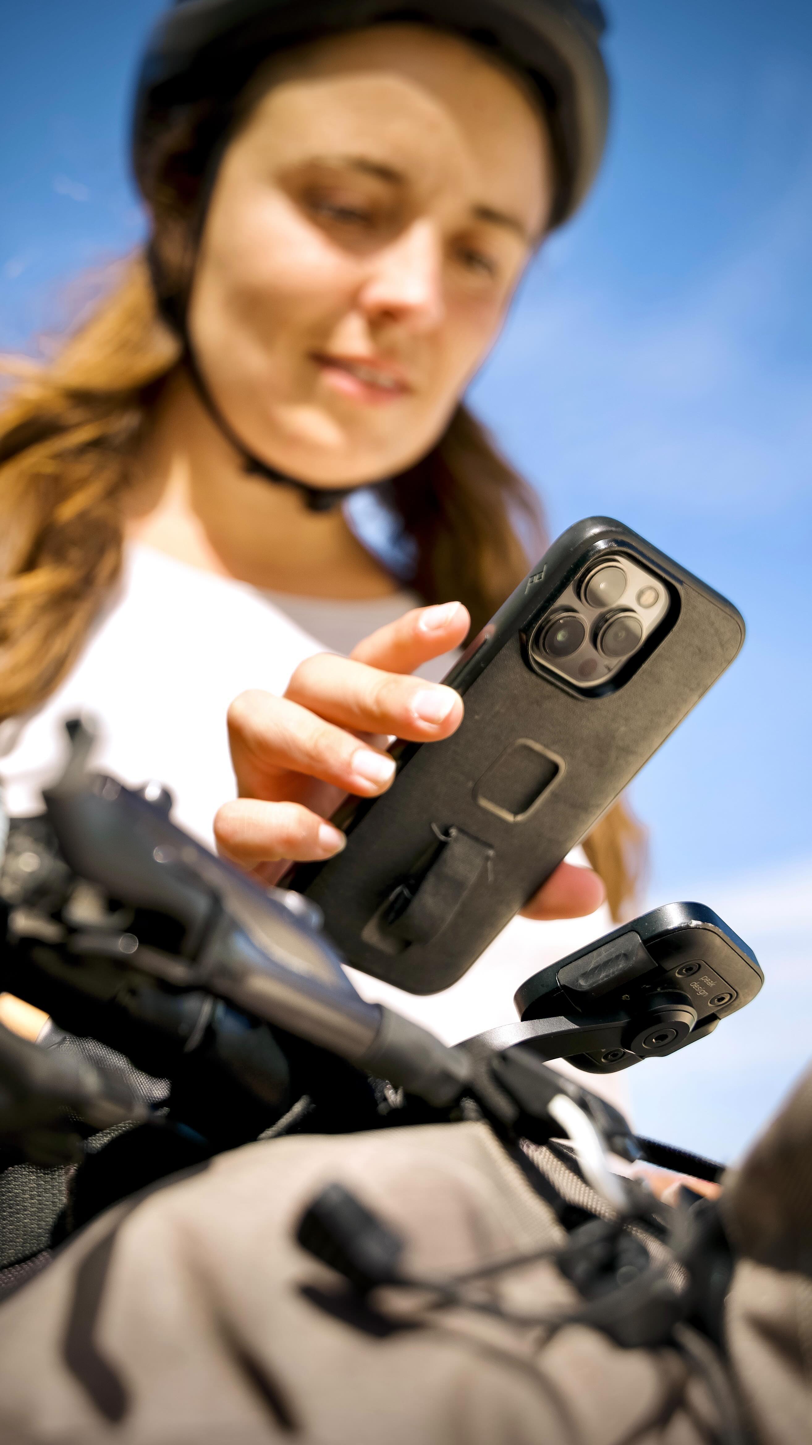 Instagram post by @belletoscan for Peak Design. Caption reads: When traveling by bike, every bit of space and....