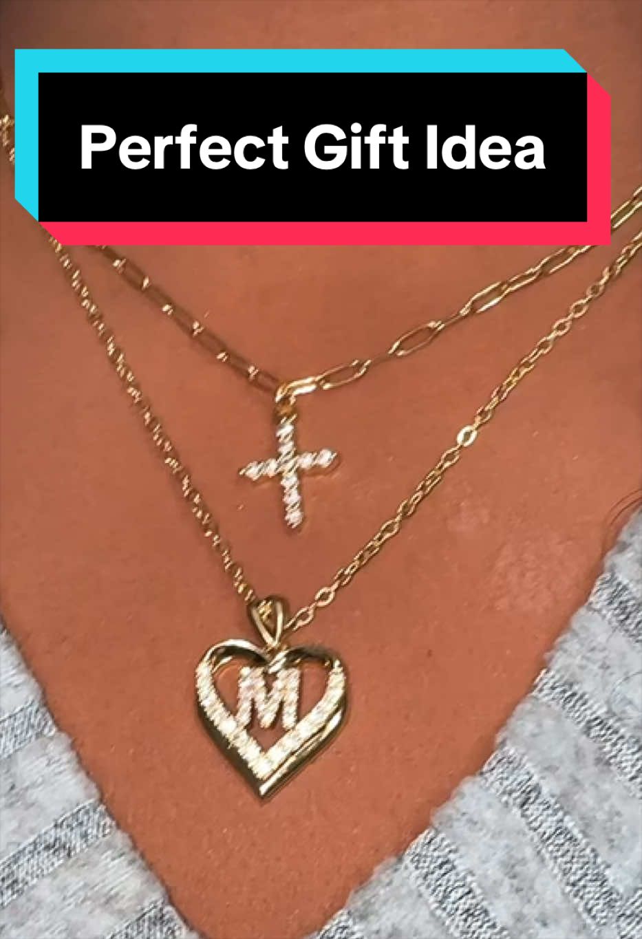 TikTok post by @cookingwithginayoung for TimelessDream. Caption reads: Elegant 14k gold-plated layered necklace with....
